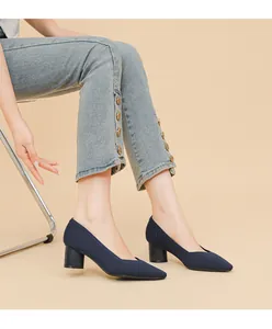 Navy blue ribbed pointed toe block heel pumps with an elegant V-neckline design