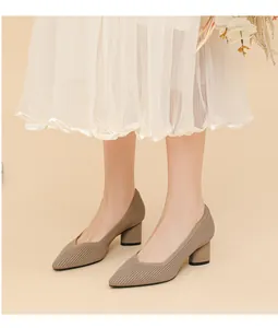 Elegant khaki ribbed block heel pumps with pointed toe and stylish V-cut vamp detail.