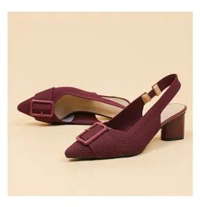 Detail of burgundy pointed-toe knit slingback heels with square buckle and chunky heel