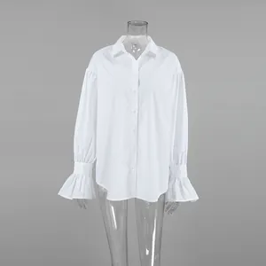 Elegant white French style cotton long-sleeve shirt with flared cuffs detail view