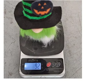 Detailed weight measurement of Halloween mini gnome doll with wizard hat showing 92 grams.