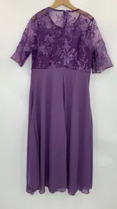 Detail view of purple midi evening dress with floral lace bodice and chiffon skirt