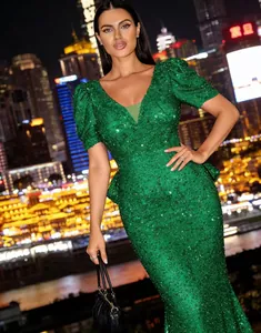 Elegant green V-neck sequined evening gown with puff sleeves and peplum waist detail