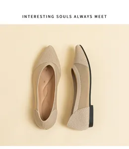 Detailed macro view of elegant beige pointed-toe knitted flat shoes for summer wear.