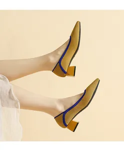 Elegant yellow knitted pointed-toe pumps with a comfortable mid-block heel for women