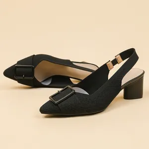 Elegant black knitted pointed-toe slingback sandals with chunky heels and buckle detail