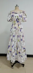 Elegant floral off-shoulder organza maxi dress with tiered skirt design for party women.