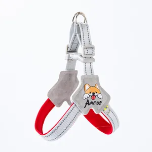 Close-up of grey reflective dog harness with red lining and cute Shiba Inu patch