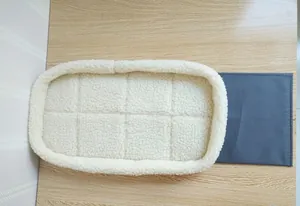 Close-up of soft sherpa liner for portable pet carrier bag, providing extra warmth.
