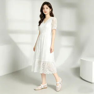 Full length view of breathable white lace Mary Jane flats with delicate floral embroidery