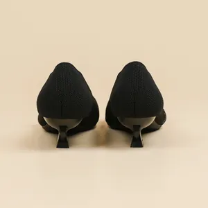 Rear view of black pointed toe fly-knit kitten heels for women, sleek minimalist style