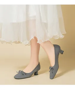 Grey knitted square toe pumps with bow detail and comfortable chunky heels