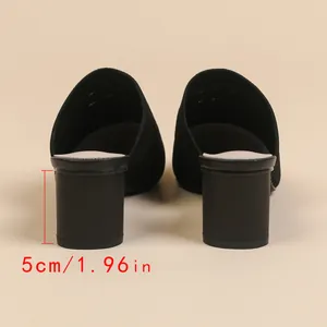 Elegant black pointed toe knit block heel mules showing 5cm heel height measurement.