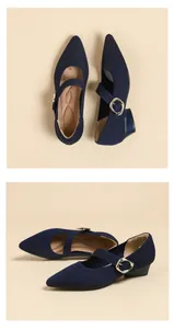 Detailed view showing navy blue pointed-toe Mary Jane knit shoes with metal buckle strap