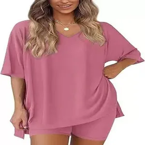 Close-up of women's comfortable dusty pink V-neck loose T-shirt and shorts lounge set