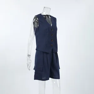Side view of navy blue cotton linen vest and cargo shorts set with button detail
