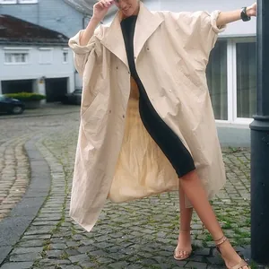 Oversized light apricot trench coat with wide lapels for women's autumn fashion