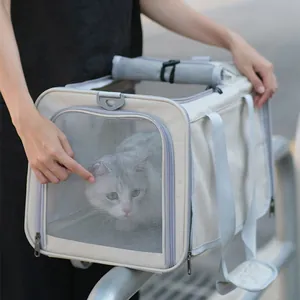 Bolsa de transporte plegable beige para gatos con ventana de malla y correa ajustable