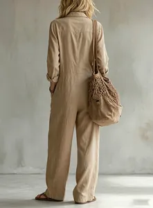Back view of a casual khaki linen jumpsuit with wide-leg design and mesh bag detail