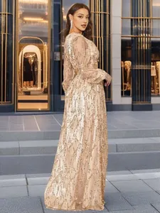 Detailed side view of elegant mesh sequin evening gown for women in champagne gold finish