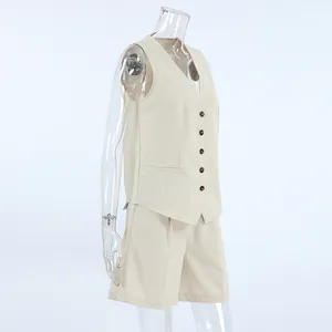 Detailed side view of khaki linen vest and shorts two-piece set on a clear mannequin
