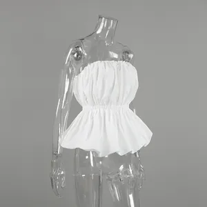 White strapless tube top featuring an elasticated gathered waist and peplum hem.