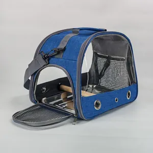 Blue portable bird carrier bag with wooden perch, stainless tray, and clear PVC window