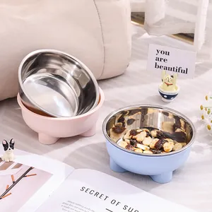 Durable double-layer stainless steel pet bowls in pastel pink and blue for dogs and cats
