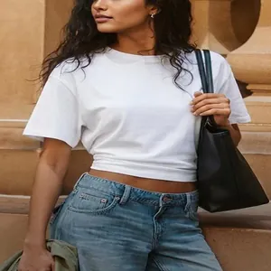 Close-up detail of a classic white round neck short sleeve cotton t-shirt for women