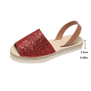 Side view of sparkly red sequin flat sandal showing 2.5cm comfortable sole height