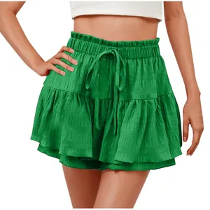 Detailed view of summer green ruffle drawstring skort showing soft fabric texture and layers