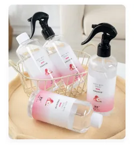 Close-up detail of 300ml pet anti-mite deodorizing spray bottles in a domestic tray