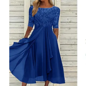 Detailed view of royal blue lace bodice and layered chiffon skirt on this midi dress