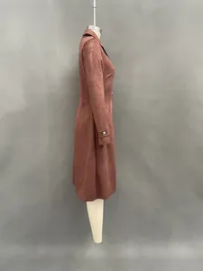 Detailed side view of a western-style suede long trench coat in terracotta brown