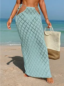 Elegant light blue crochet knit maxi skirt featuring sexy side ties for summer beach wear