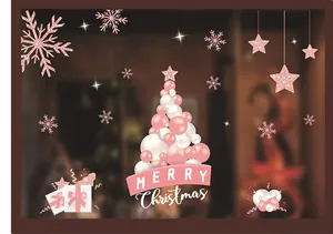 Detalle del adhesivo de ventana de árbol de Navidad rosa y blanco con texto de Feliz Navidad