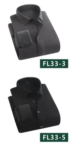 Detalle de camisas cálidas con forro polar dobladas en color gris oscuro y negro