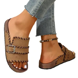 Retro brown suede platform slide sandals with decorative stitching and buckle