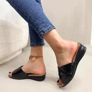 Elegant black wedge slide sandals for women with cross-strap design for summer wear