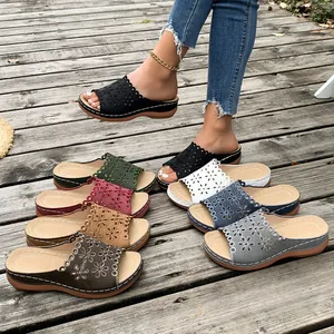 Multi-color collection of women's peep-toe platform wedge sandals with laser-cut flowers.