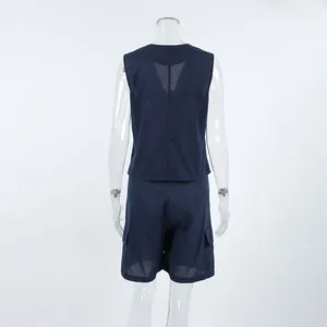 Back view of navy blue cotton linen sleeveless vest and shorts set on mannequin