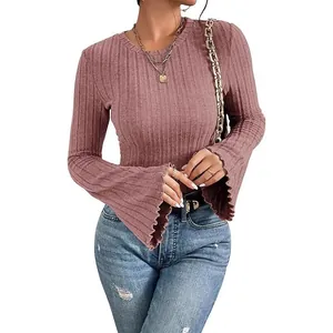 Detailed view of women's ribbed long sleeve top with elegant bell sleeves in mauve