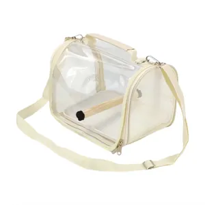 Portable bird travel bag featuring a transparent window, mesh sides and a wooden perch