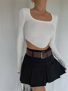 Detailed close-up of a white ribbed knit crop top featuring a chic square neck design