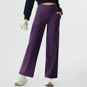 Full length view of purple high-waisted yoga pants with pockets and straight leg cut