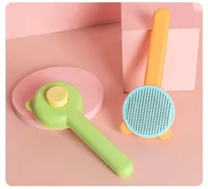 Close-up view of cute bear-shaped pet grooming brush for cats and dogs deshedding