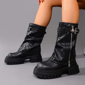 Stylish black leather platform boots featuring square toe design and metal buckle detail
