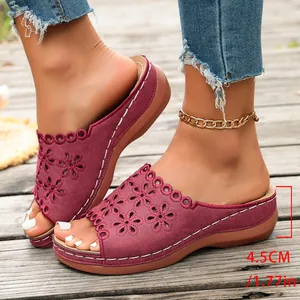 Burgundy women's wedge sandals with floral cutouts and comfortable 4.5cm platform heel