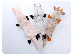 Three flat animal-shaped plush dog toys featuring rabbit, wolf and cow designs for pets.