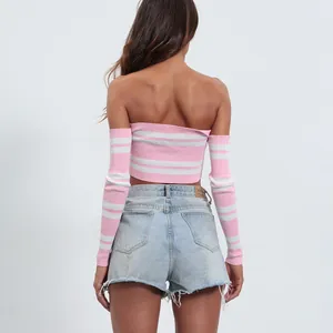 Back view of pink and white striped off-the-shoulder long sleeve cropped knit top for women